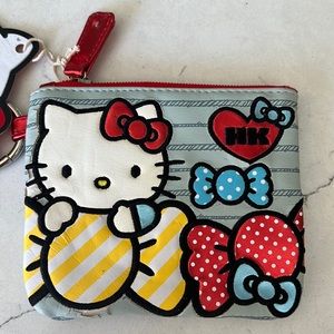 Brand new never worn with tags. Hello kitty coin purse.